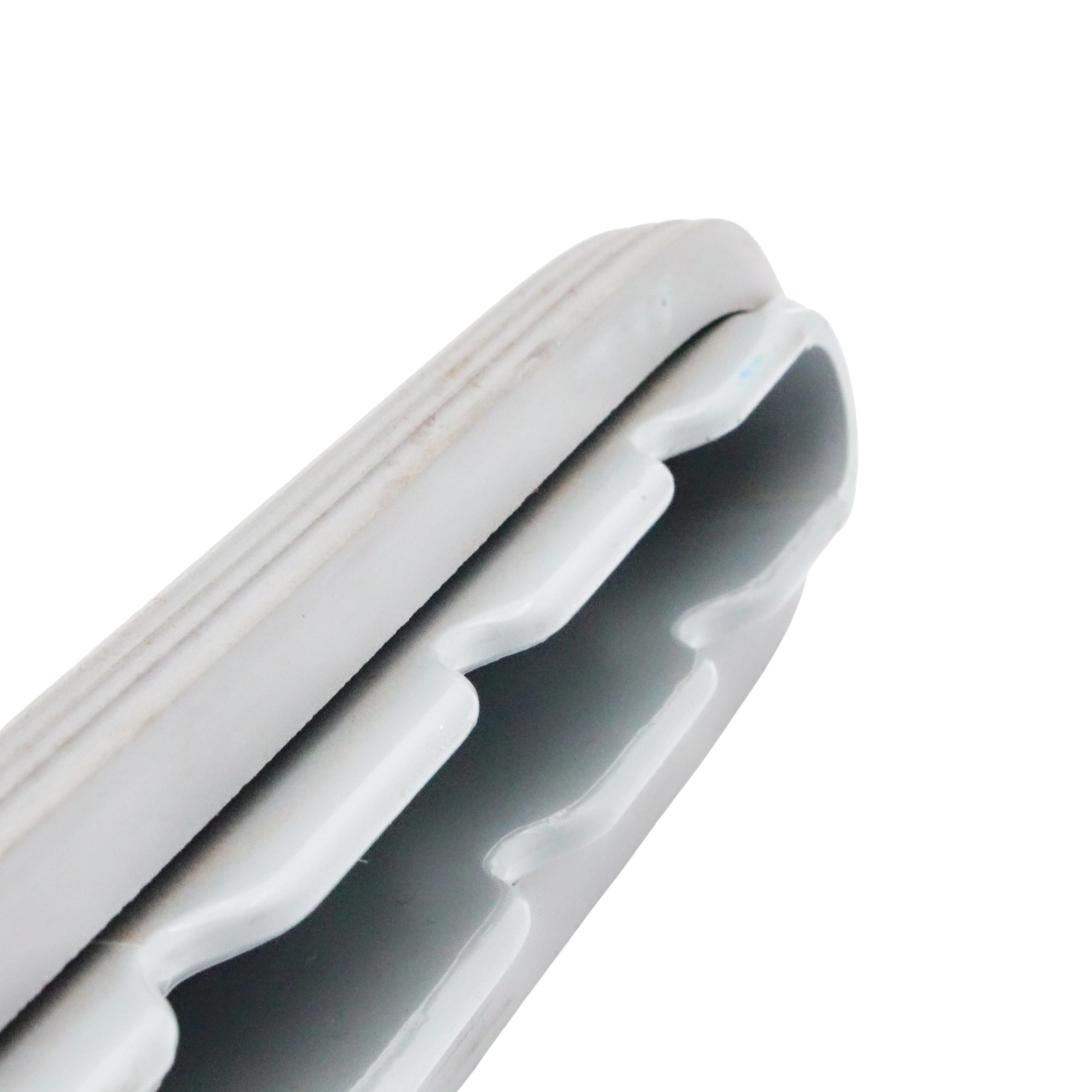 Close-up of scallop head design showing airflow channels and bumper