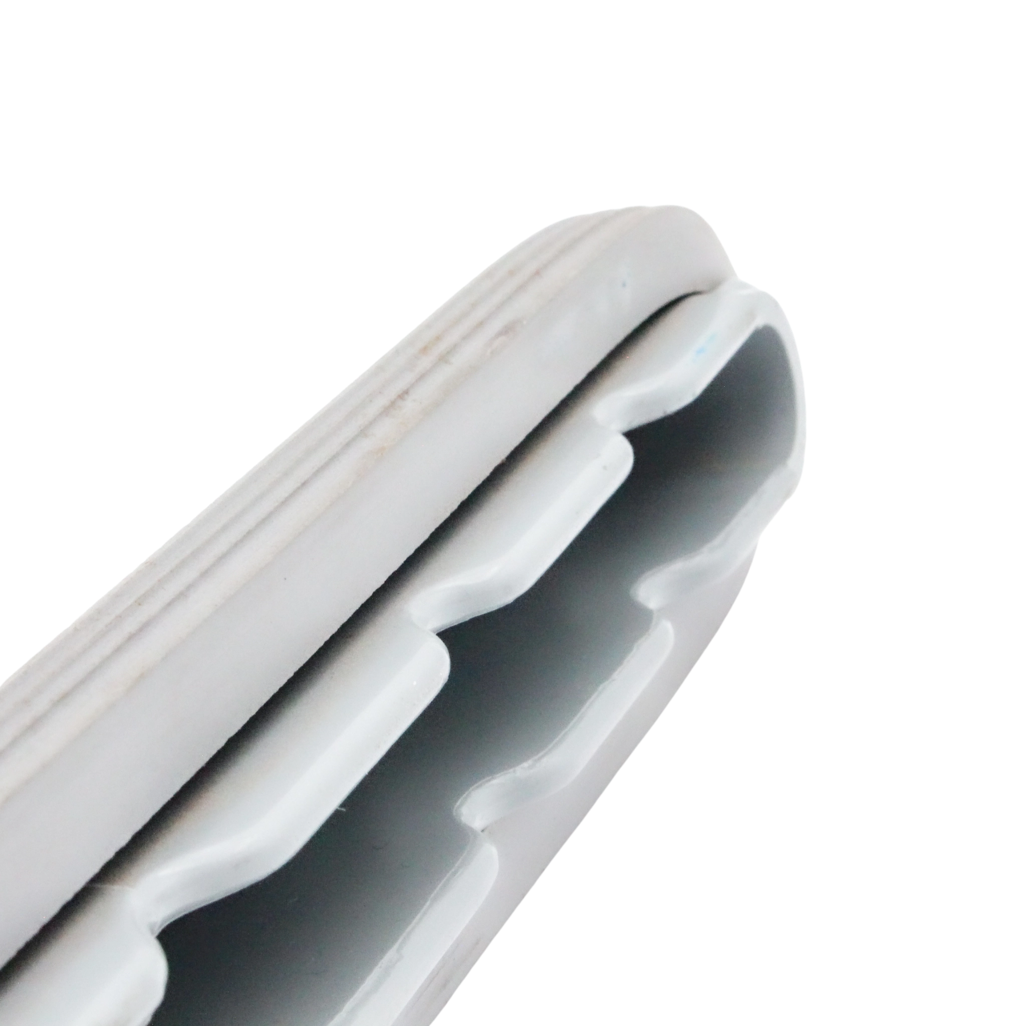 Close-up of scallop head design showing airflow channels and bumper