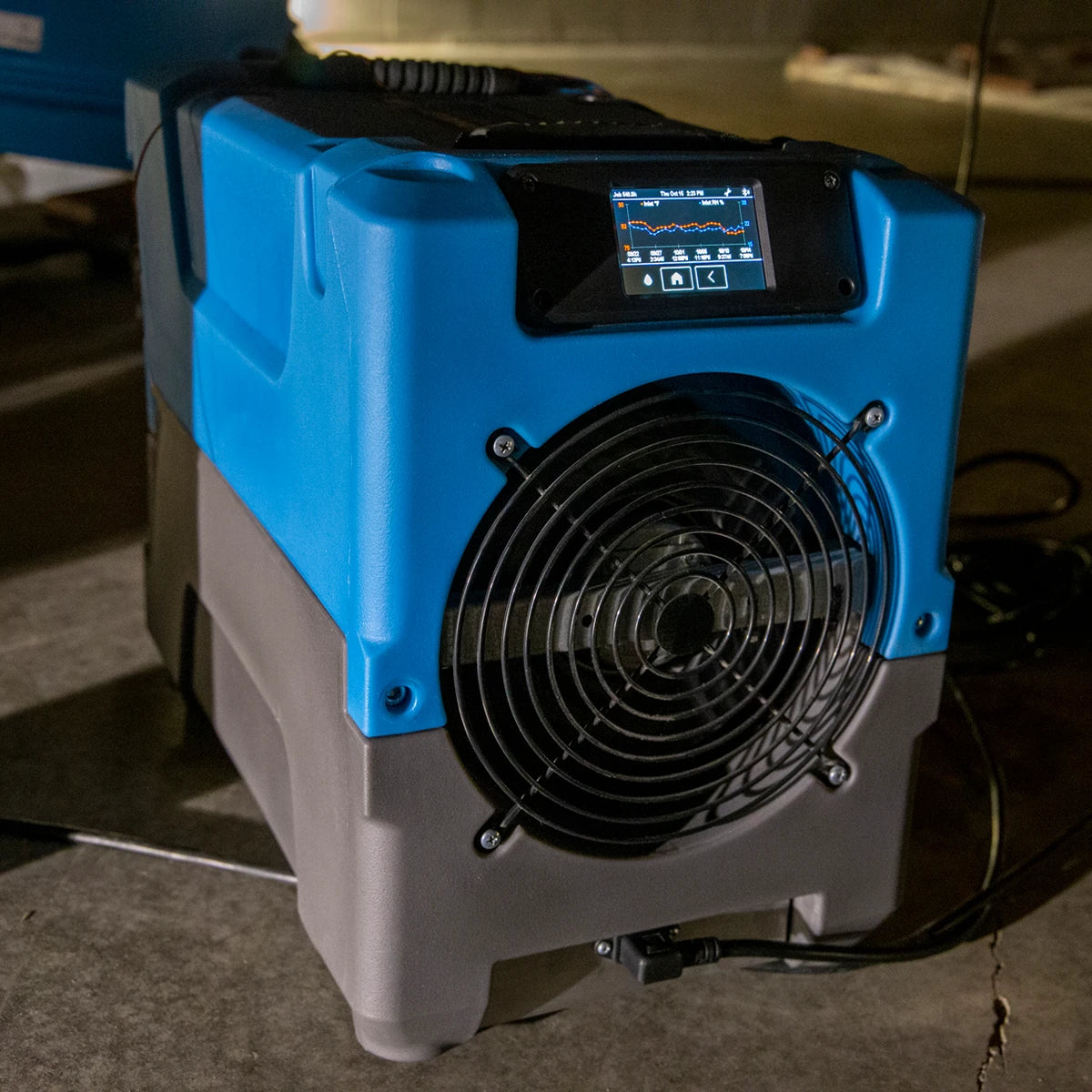 Dri-Eaz Revolution LGR Dehumidifier operating with active control panel display