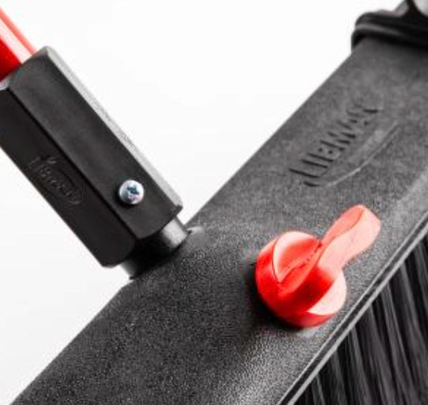 Libman Broom attached to dustpan for efficient floor cleanup