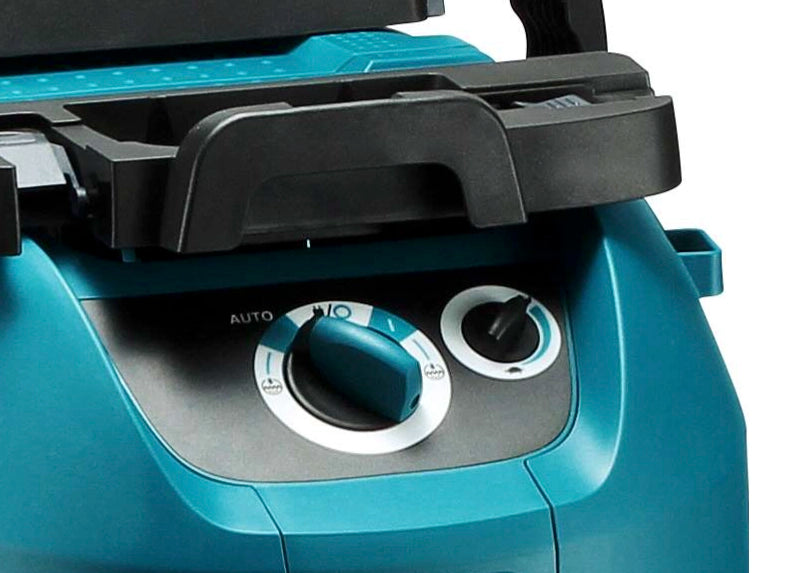Makita VC4210L close-up showing power mode dial with auto, on, and off settings