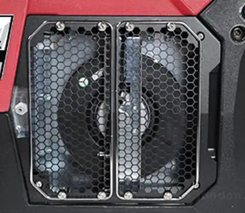 Close-up of Phoenix DryMAX XL Red Dehumidifier grille revealing dual fan assembly for high-performance moisture removal