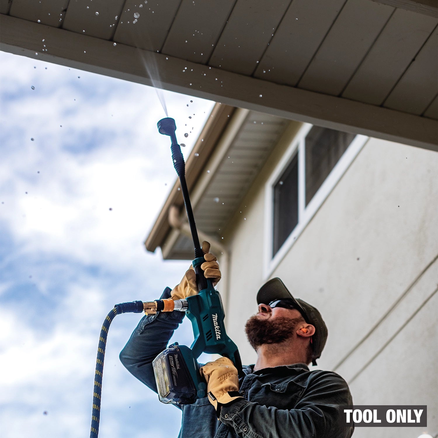 Person using a pressure washer tool on a house exterior with 'Tool Only' text.
