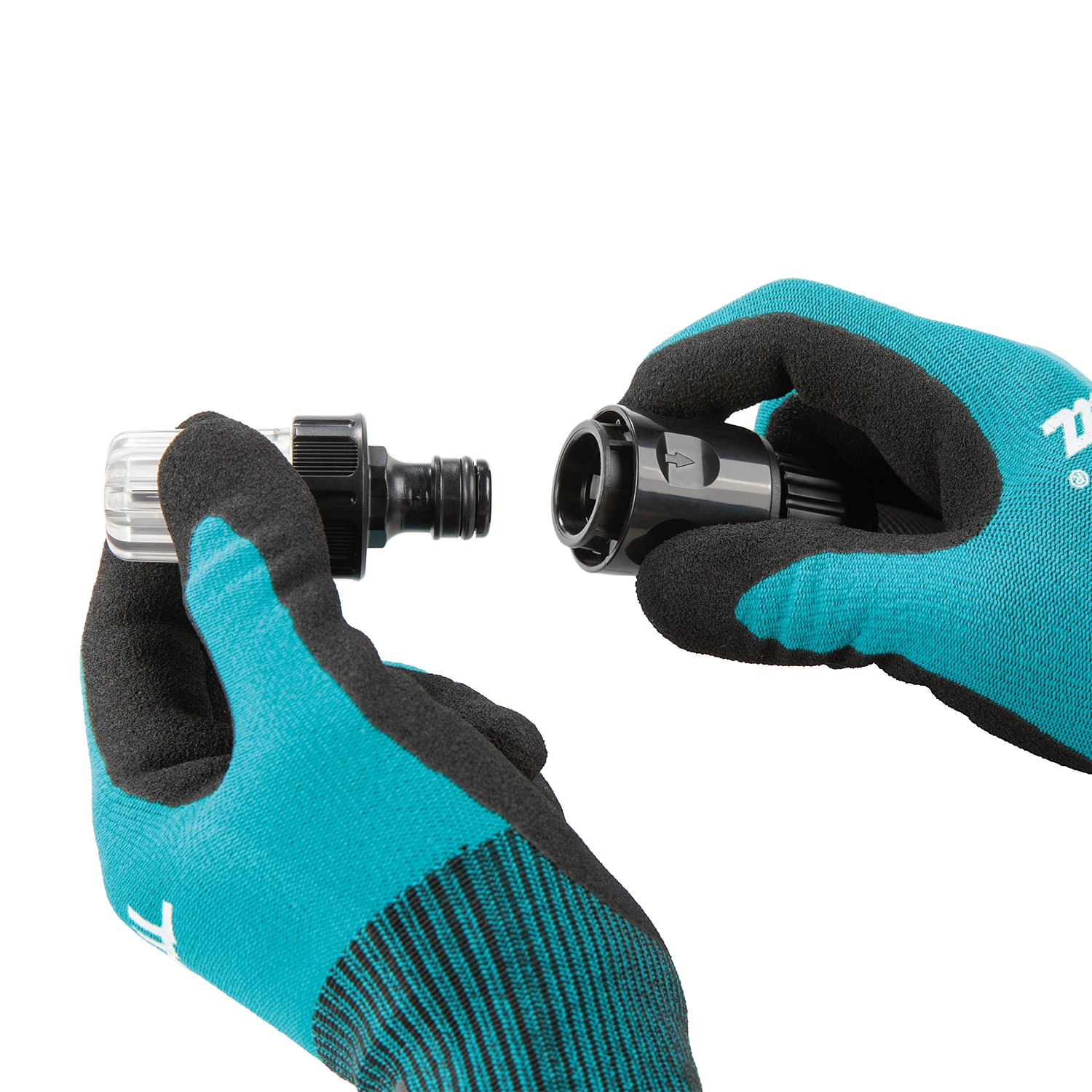 Teal and black gloves holding garden nozzles on a white background