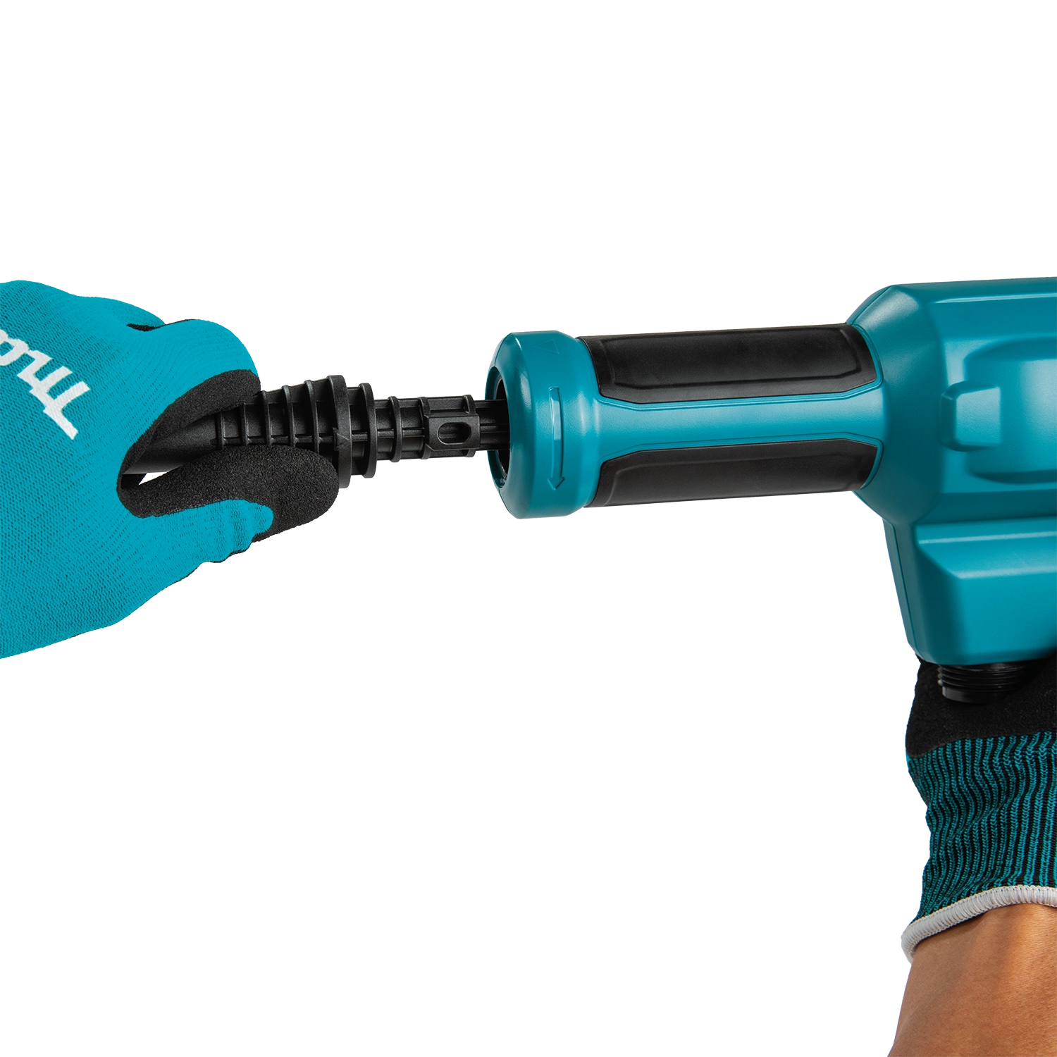 Close-up of a blue drill with black nozzle on a white background