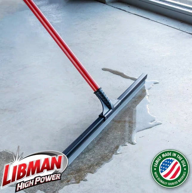 Libman 24 inch squeegee in use pushing water across tile floor

