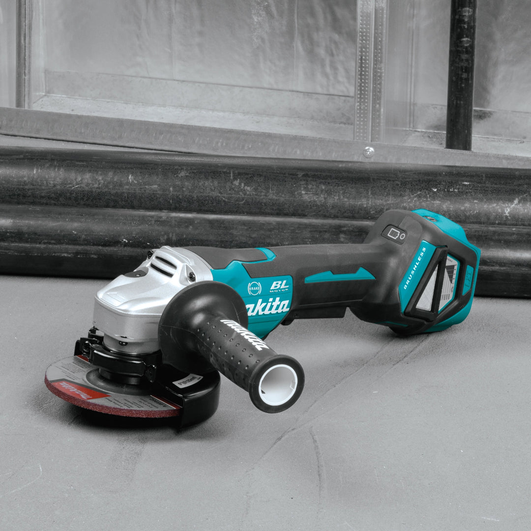 makita grinder angled view on job site during metal cutting task
