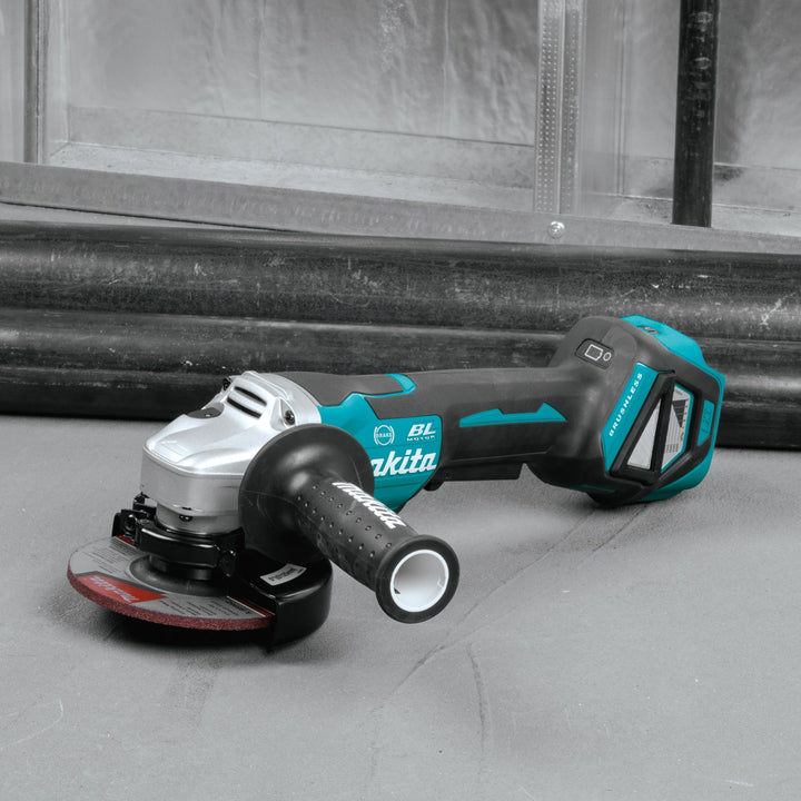 makita grinder angled view on job site during metal cutting task
