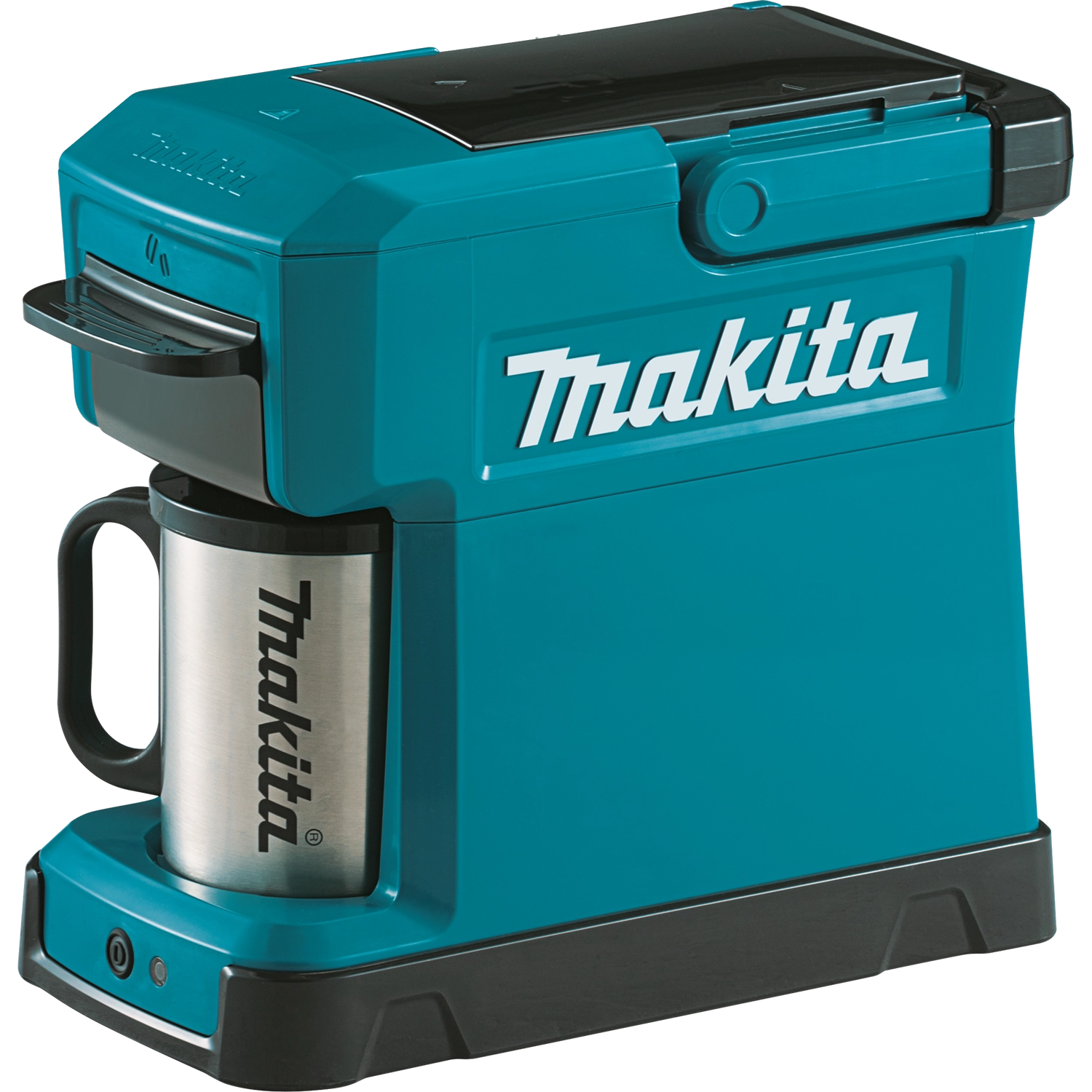 angled view of makita coffee maker with included cup on job site
