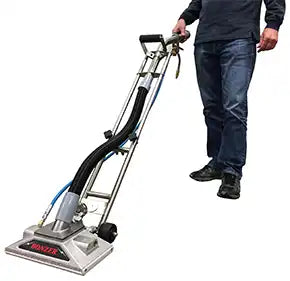 Side profile of Bonzer extractor displaying handle and vacuum ports
