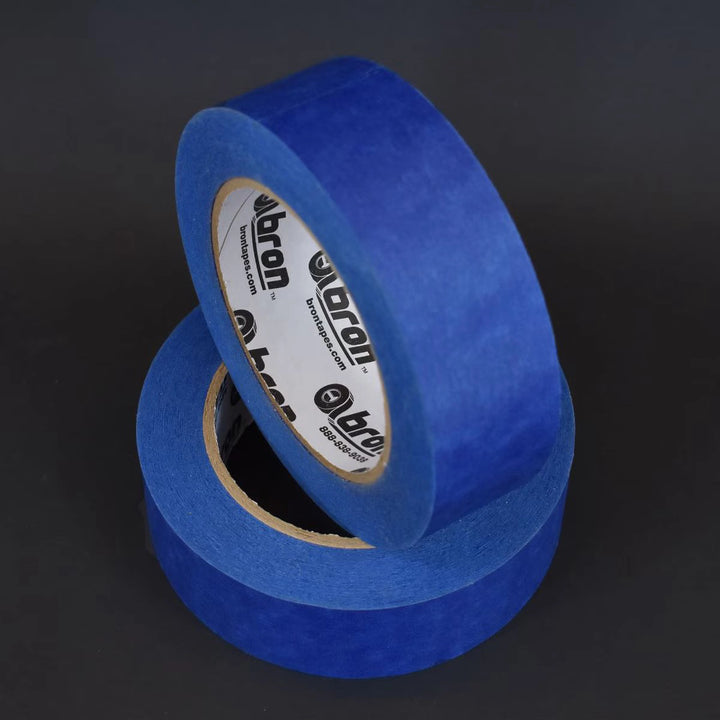 Bron Blue Painter’s Tape in a dimly lit workspace for night or low-light jobs

