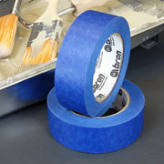 Bron Blue Painter’s Tape applied on trim during interior painting job
