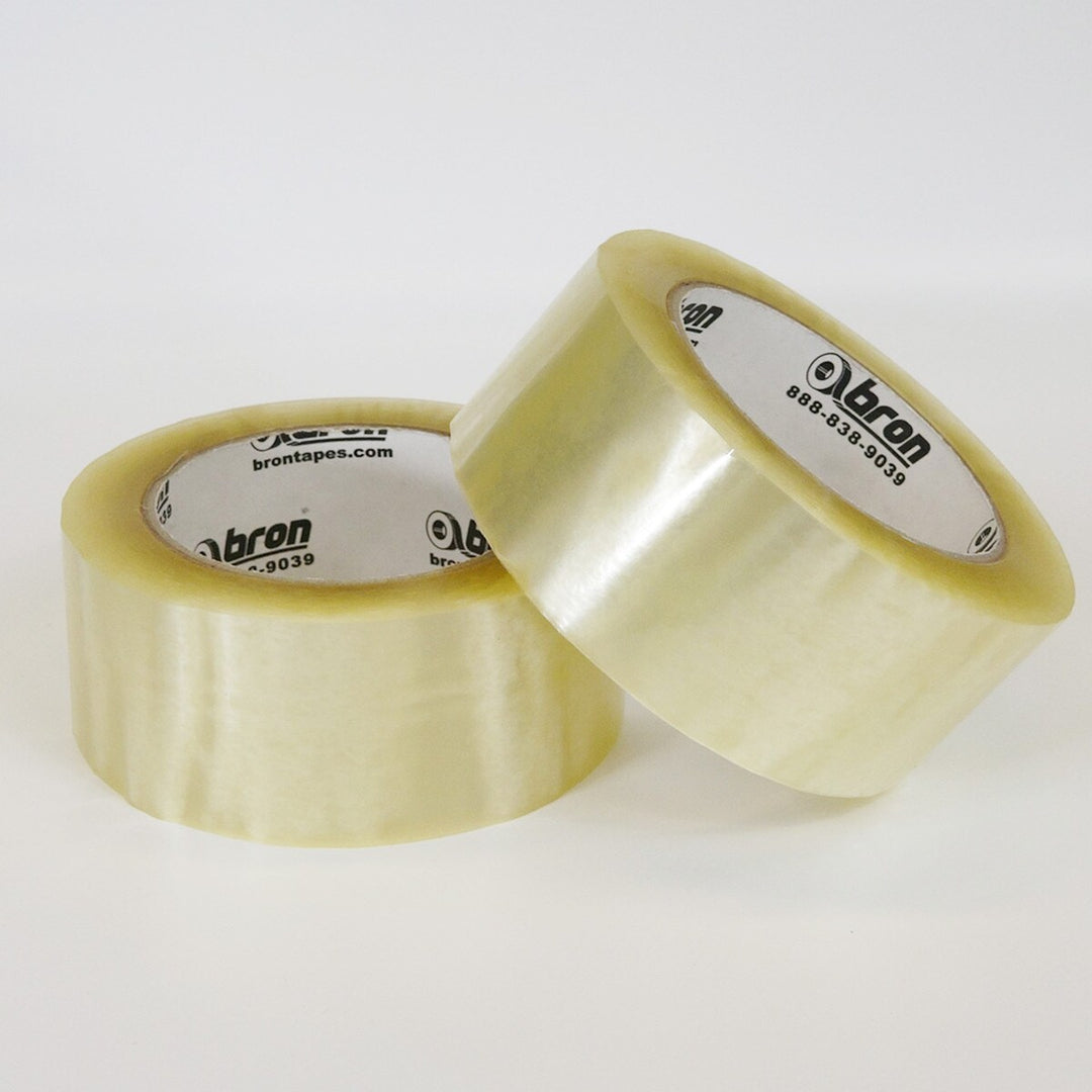Side angle of Bron Clear Packing Tape roll showing thickness and core detail
