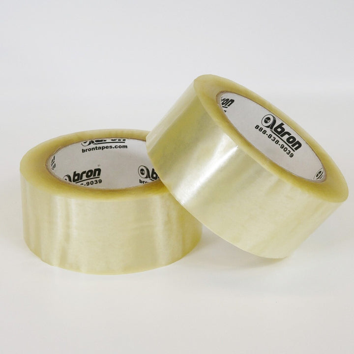 Side angle of Bron Clear Packing Tape roll showing thickness and core detail
