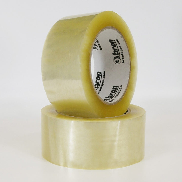 Bron Clear Packing Tape firmly applied and sticking to a cardboard box
