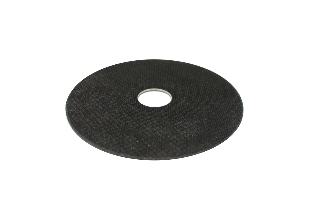 Back side of Caliastro 4.5-inch cut off wheel showing abrasive surface and grit texture
