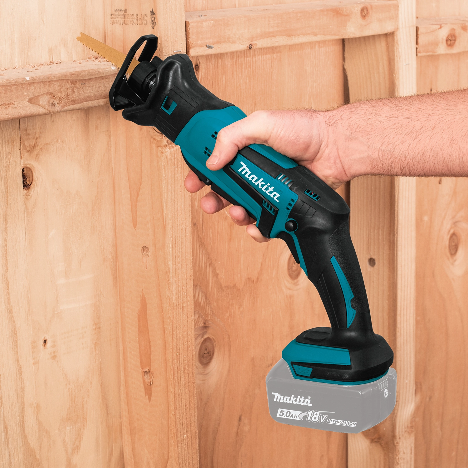 cutting wood with makita 18v lxt compact recipro saw showing clean cut performance
