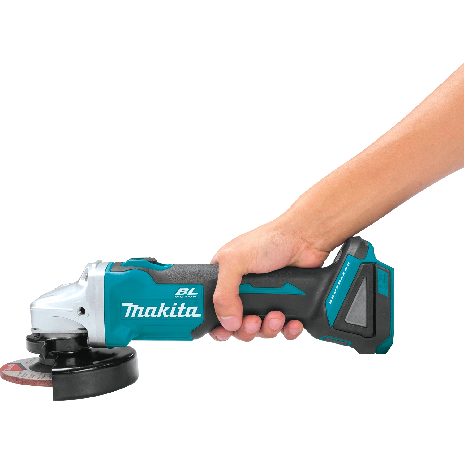 Worker holding Makita 18V grinder in active grip position
