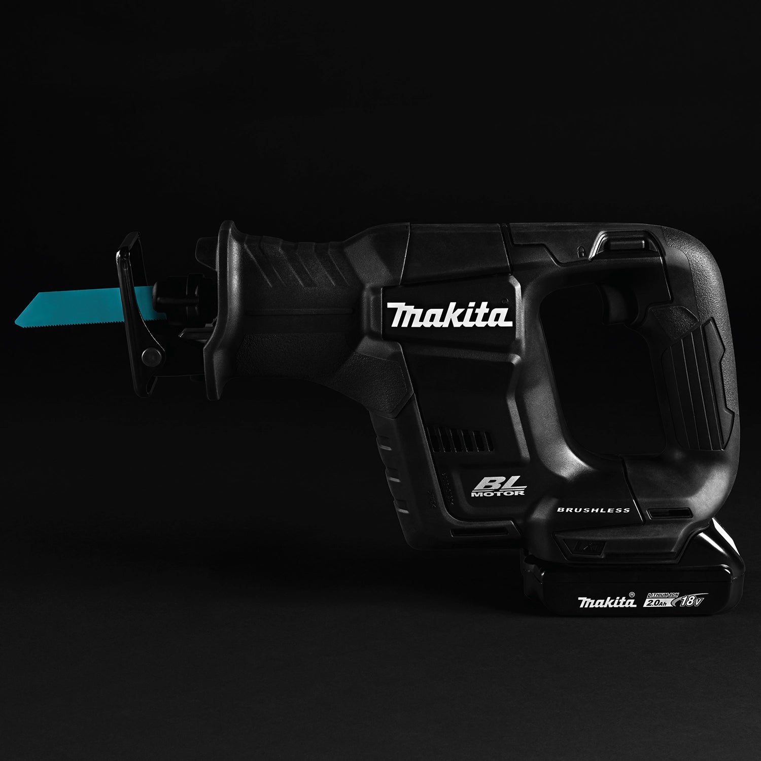 dark side view of makita xrj07zb saw showing led light beam and compact silhouette
