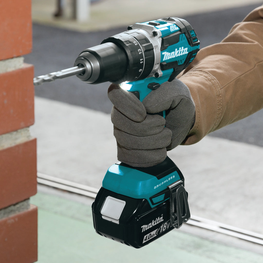 makita hammer drill driving into brick wall with precision and power
