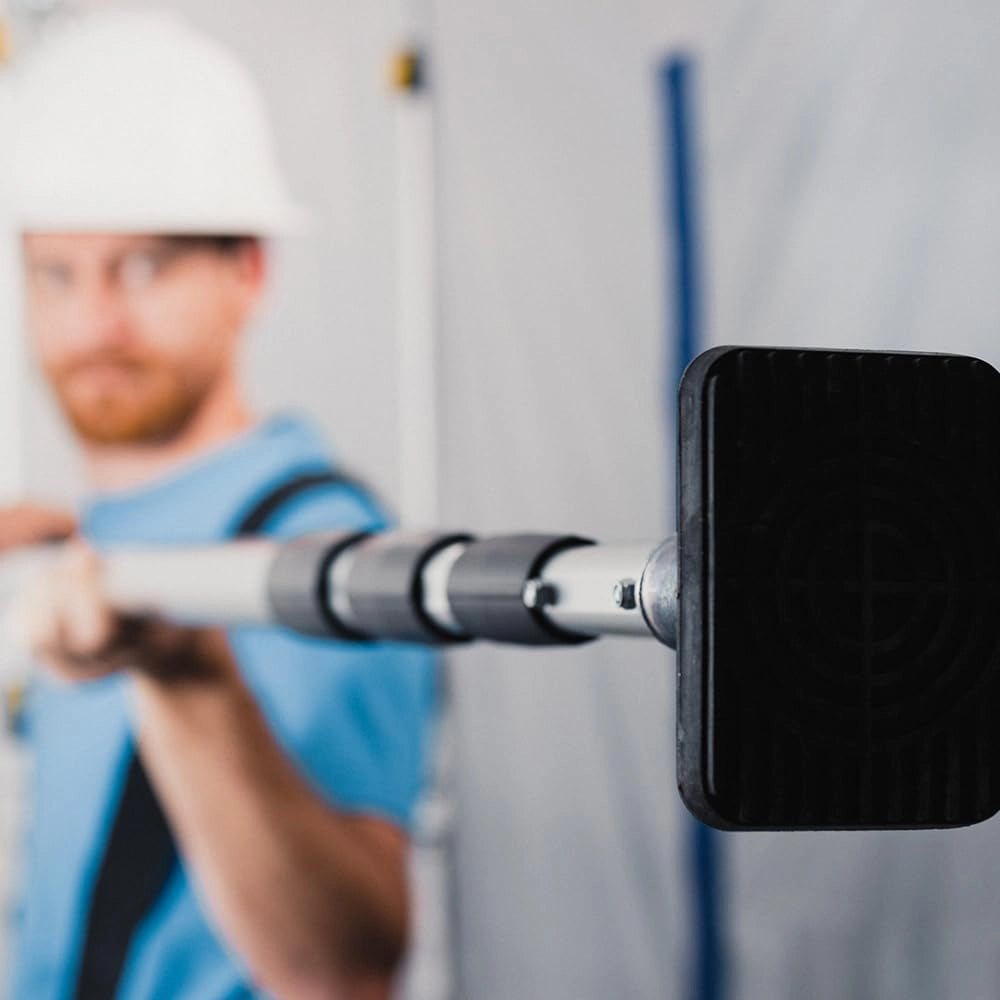 Bottom of E-Z UP 20-foot pole showing base and stabilizer design
