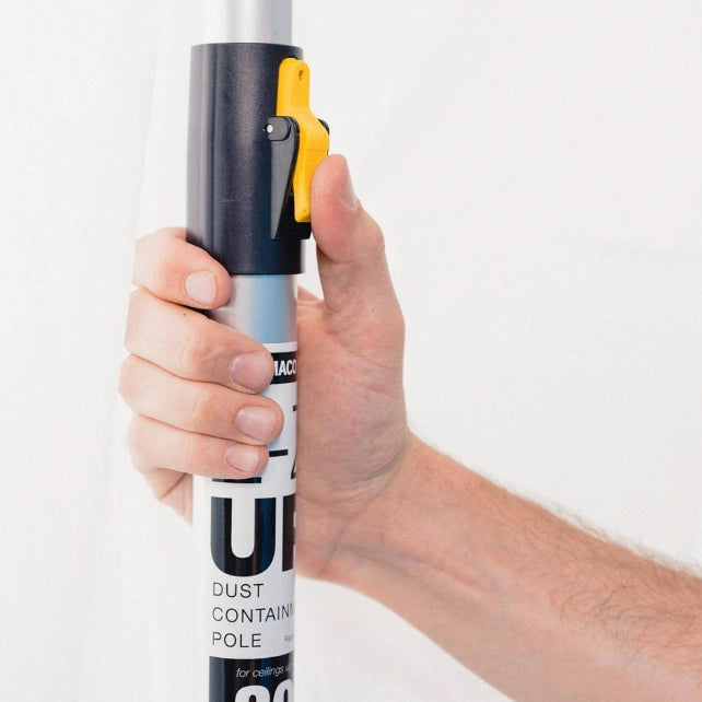 Close-up of E-Z UP pole clip designed for attaching tarps or sheeting securely
