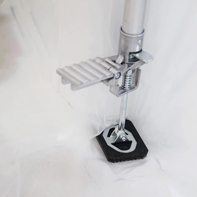 Close-up of E-Z UP pole foot with wide base for added ground stability
