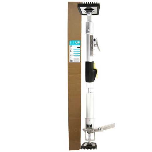 E-Z UP support poles standing next to retail box packaging with branding visible
