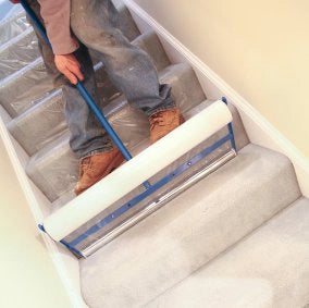 Applying film on staircase using Trimaco Film Applicator
