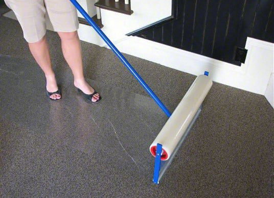 Top-down view of Trimaco Film Applicator laying protective film
