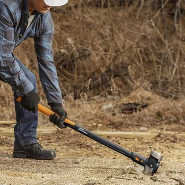 Worker using Fiskars 8lb Sledge Hammer on demolition site
