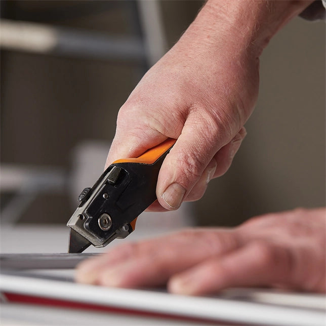 Fiskars Drywaller’s Knife/Saw being used in real jobsite drywall installation

