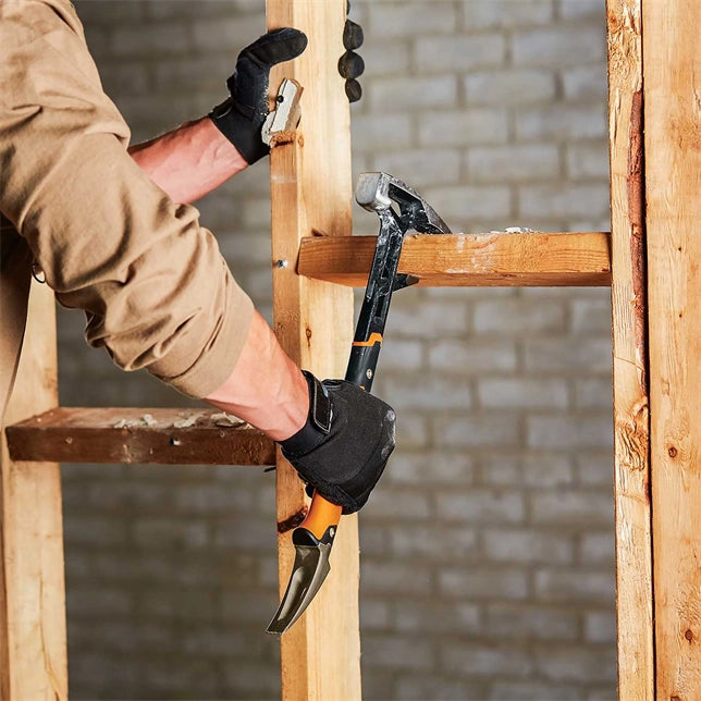 Fiskars IsoCore tool used during demolition to break and pry materials
