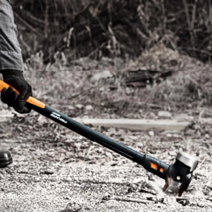 Sledge hammer in use breaking up flooring on job site
