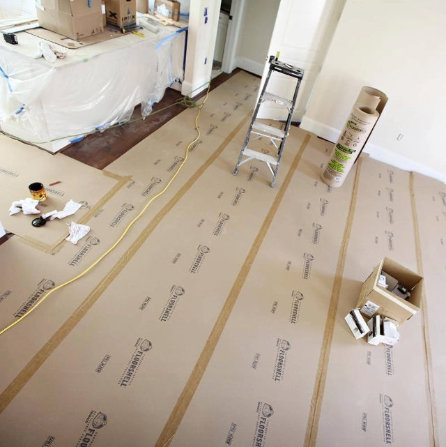 Trimaco FloorShell protecting concrete floor on active construction job site
