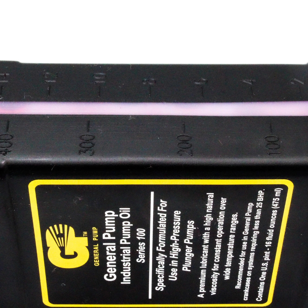 Close-up showing pink liquid inside General Pump Series 100 oil bottle

