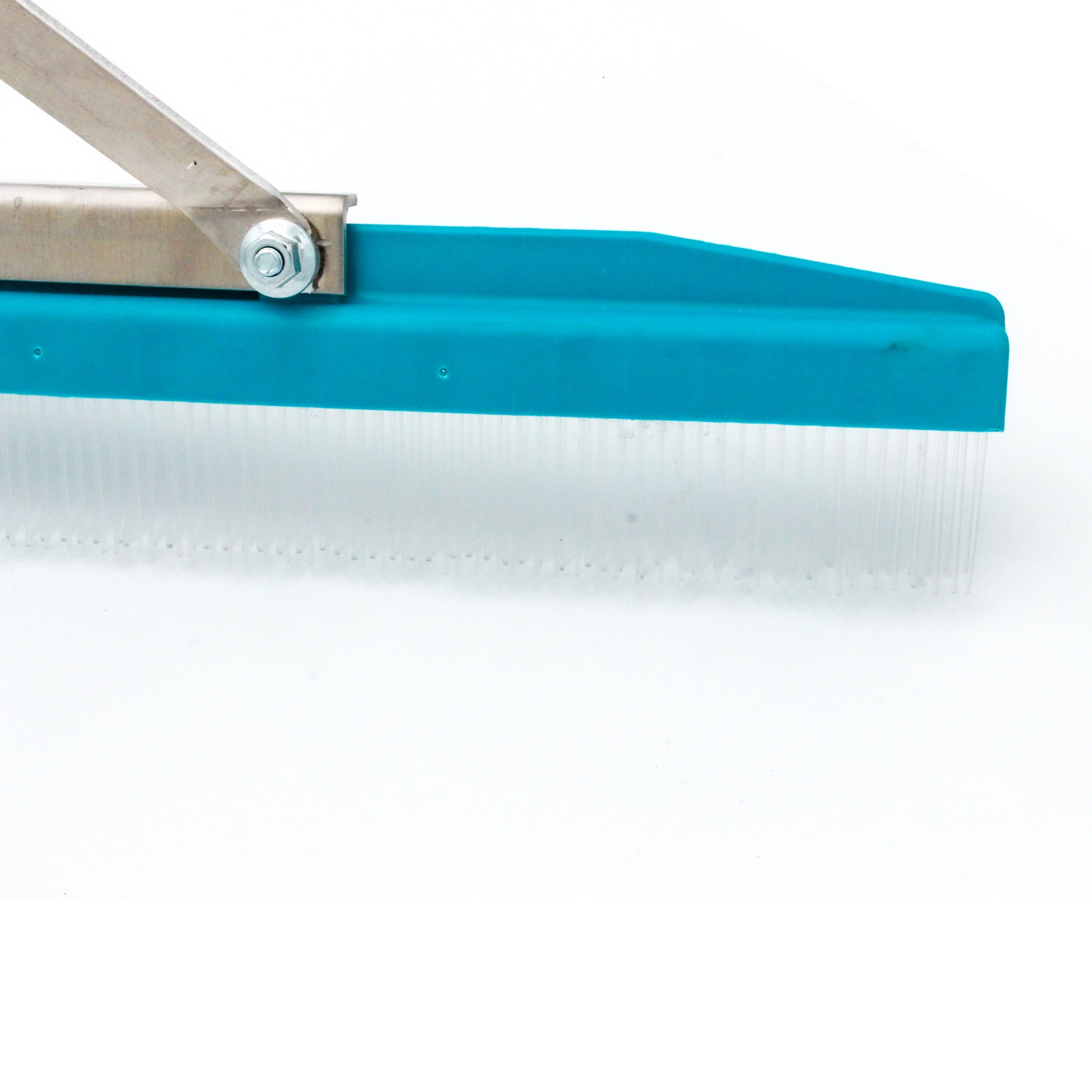 close-up of right edge of grandi groom rake showing bristle alignment
