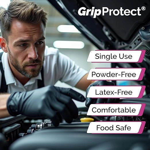 GripProtect nitrile gloves in active use for chemical cleanup on jobsite
