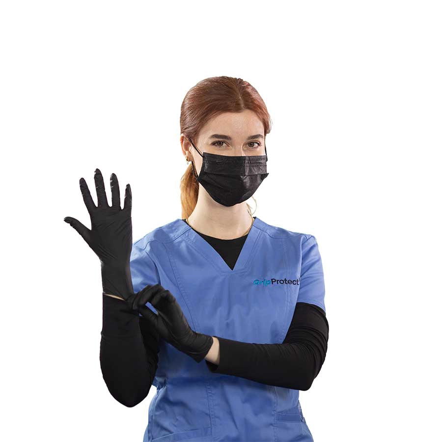 GripProtect black nitrile gloves worn by professional during restoration work
