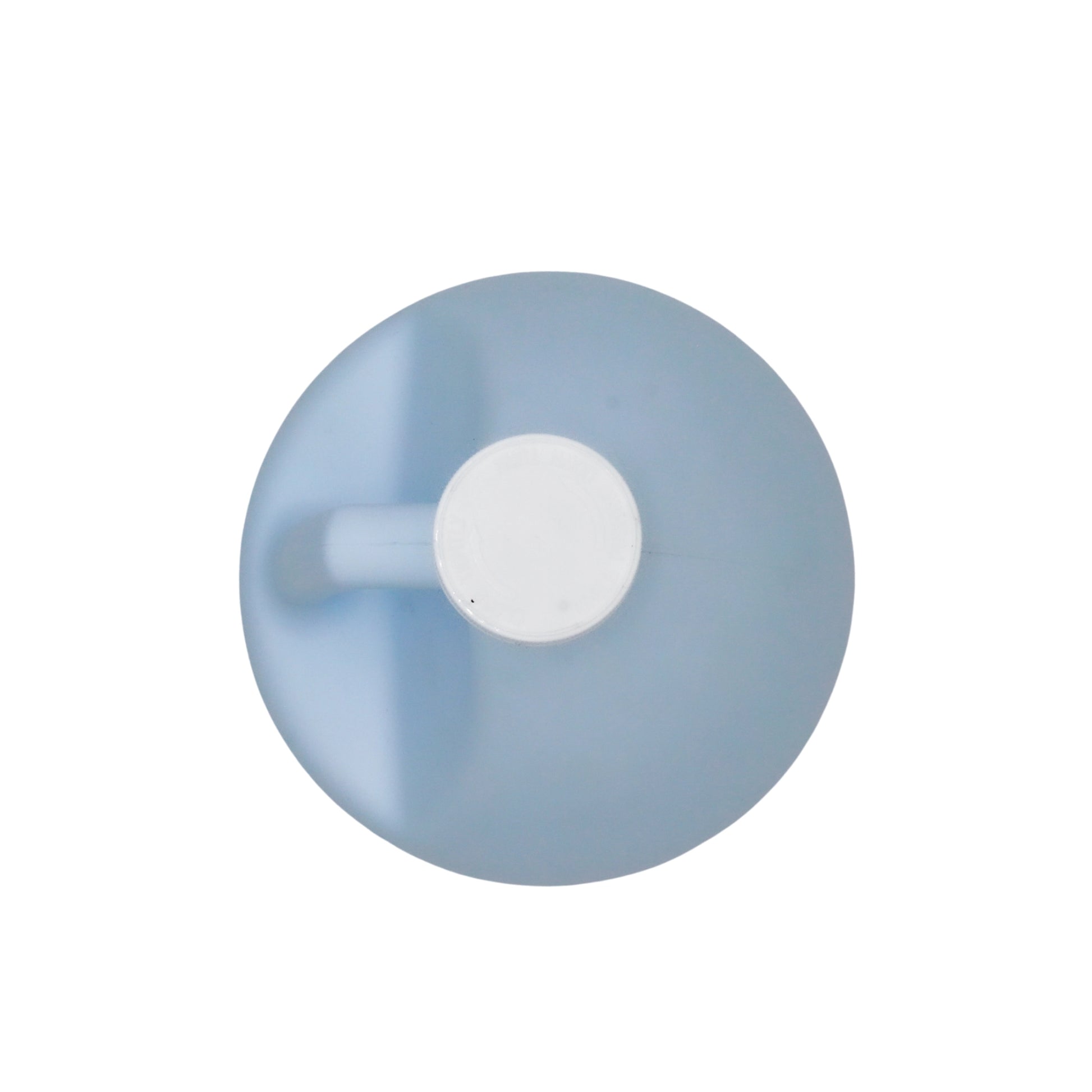 top of descaler attachment showing connection points and cap
