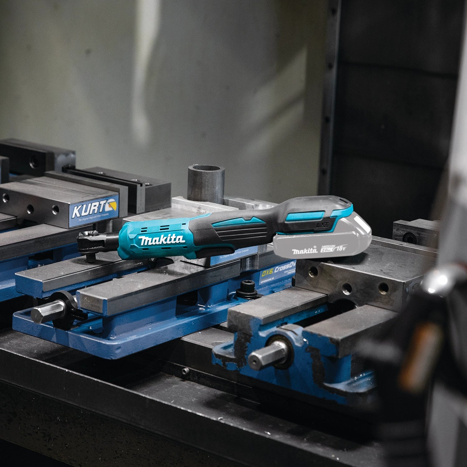 makita cordless ratchet loosening fastener in mechanical repair environment
