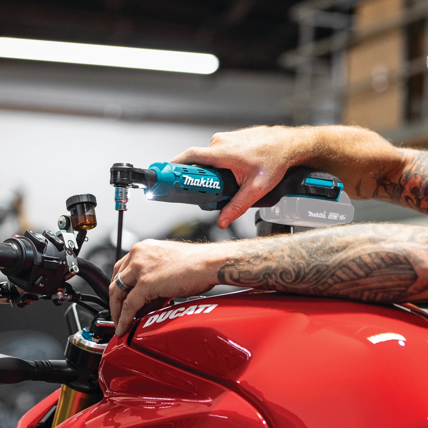 makita 18v cordless ratchet used on pipe fitting installation at job site
