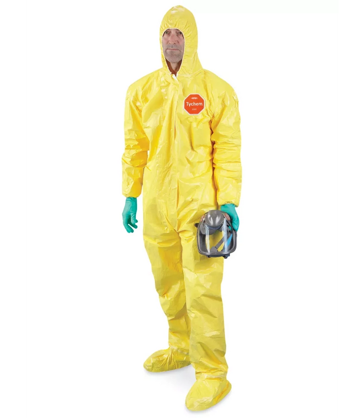 Protective suit being worn during containment setup at restoration job site

