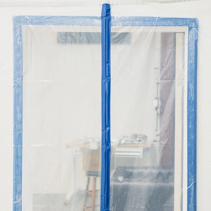 EZ-UP magnetic door in use on restoration job for dust control
