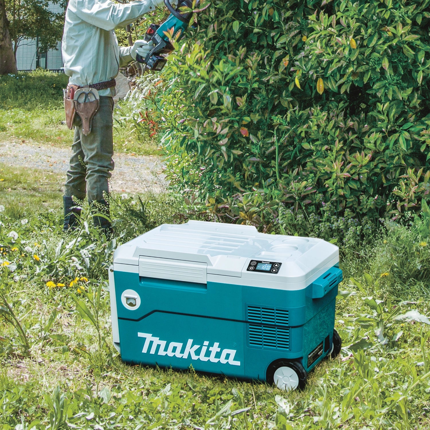 makita cooler warmer box full of snacks and drinks on job site
