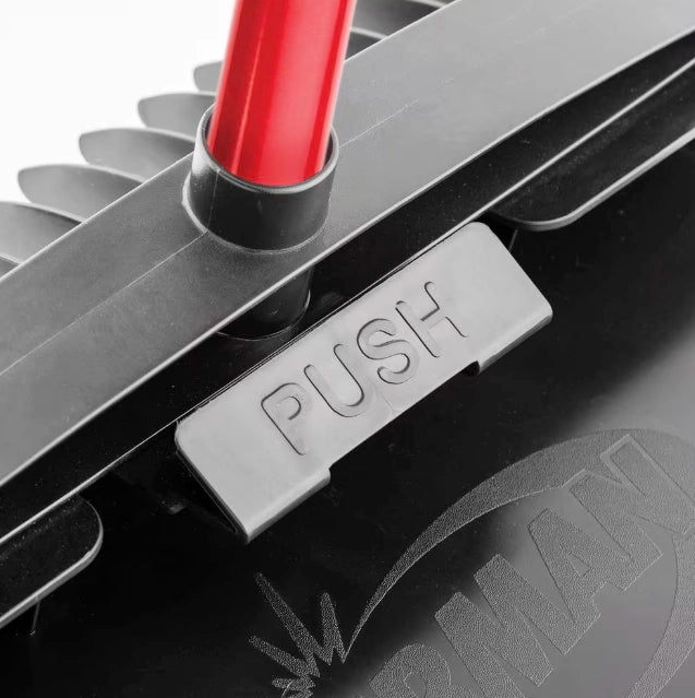 Push button locking system on Libman dust pan handle
