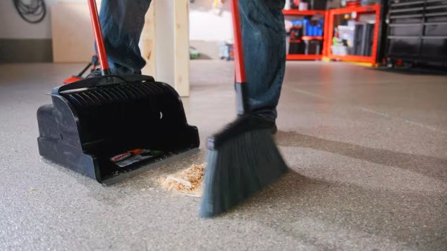 Sweeping large debris into Libman large scoop dust pan
