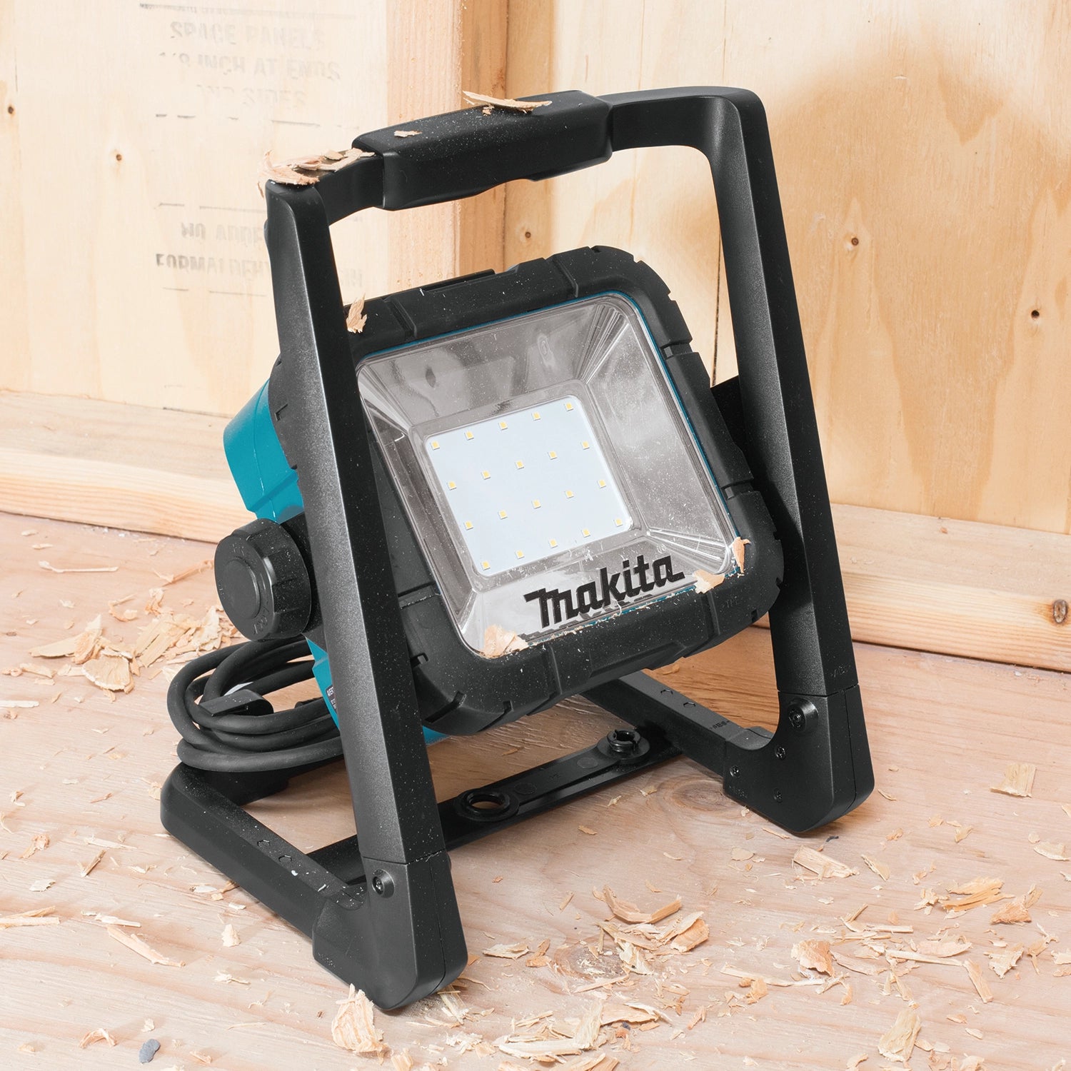 makita led work light in use on job site illuminating work area
