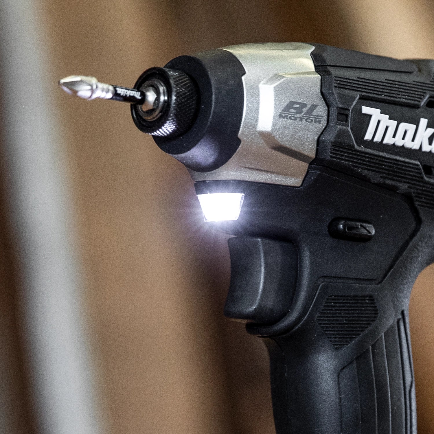 makita sub-compact drill led light in use on job site in low visibility conditions
