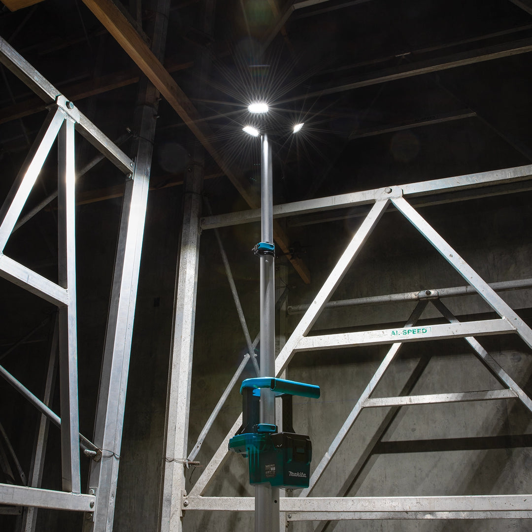 makita tower work light lighting up large site with multiple adjustable led heads
